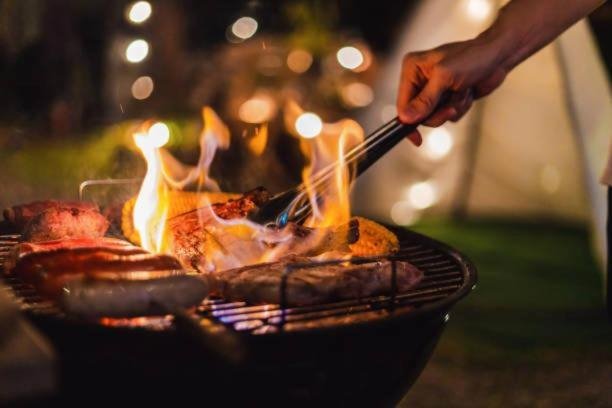 Outdoor barbecue grill at night