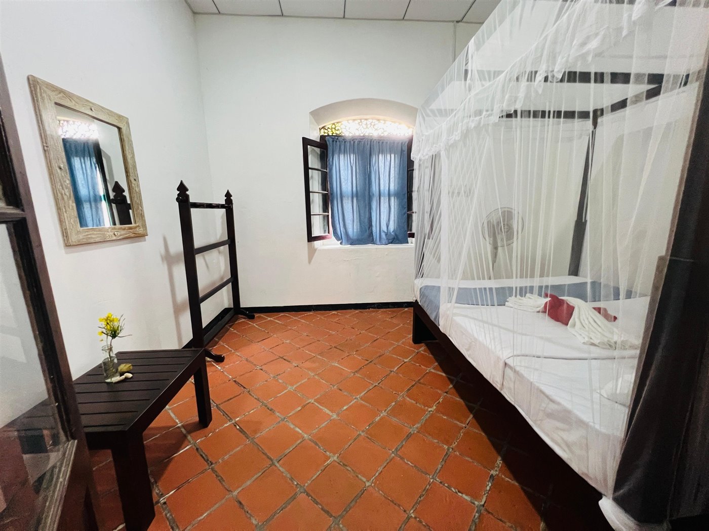 Prepared bed with towel arrangement