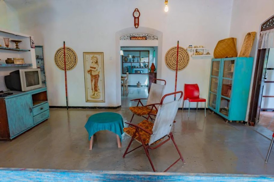 Living room with blue seating